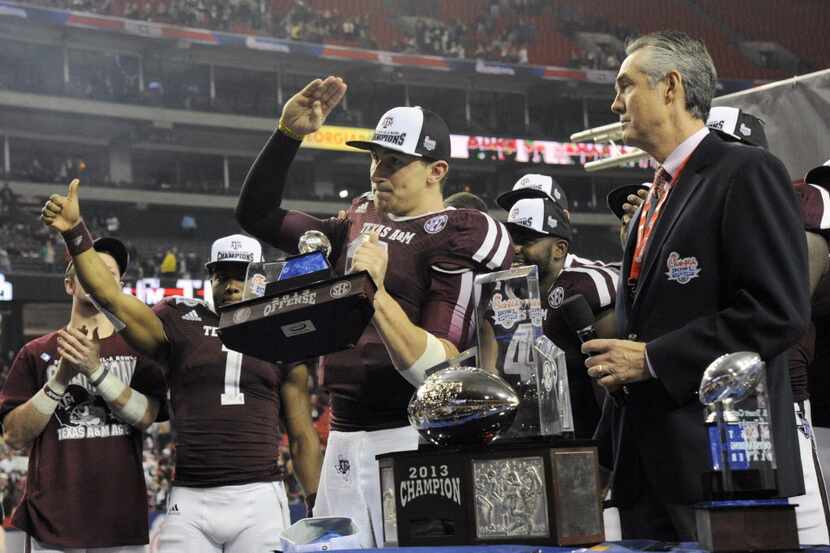 Dec 31, 2013; Atlanta, GA, USA;  Texas A&M Aggies quarterback Johnny Manziel (2) salutes the...