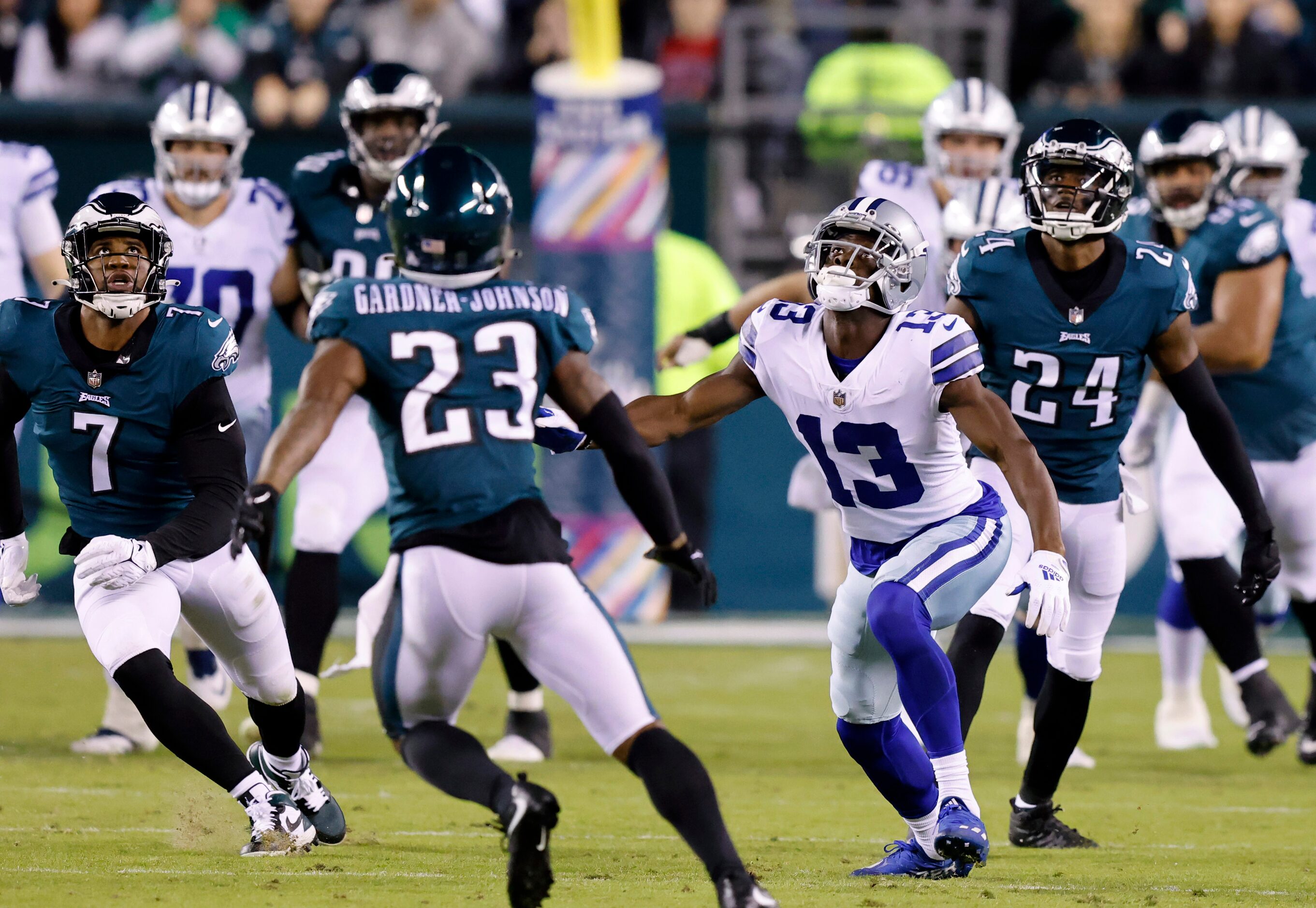 Dallas Cowboys wide receiver Michael Gallup (13) looks up at his tipped pass before...