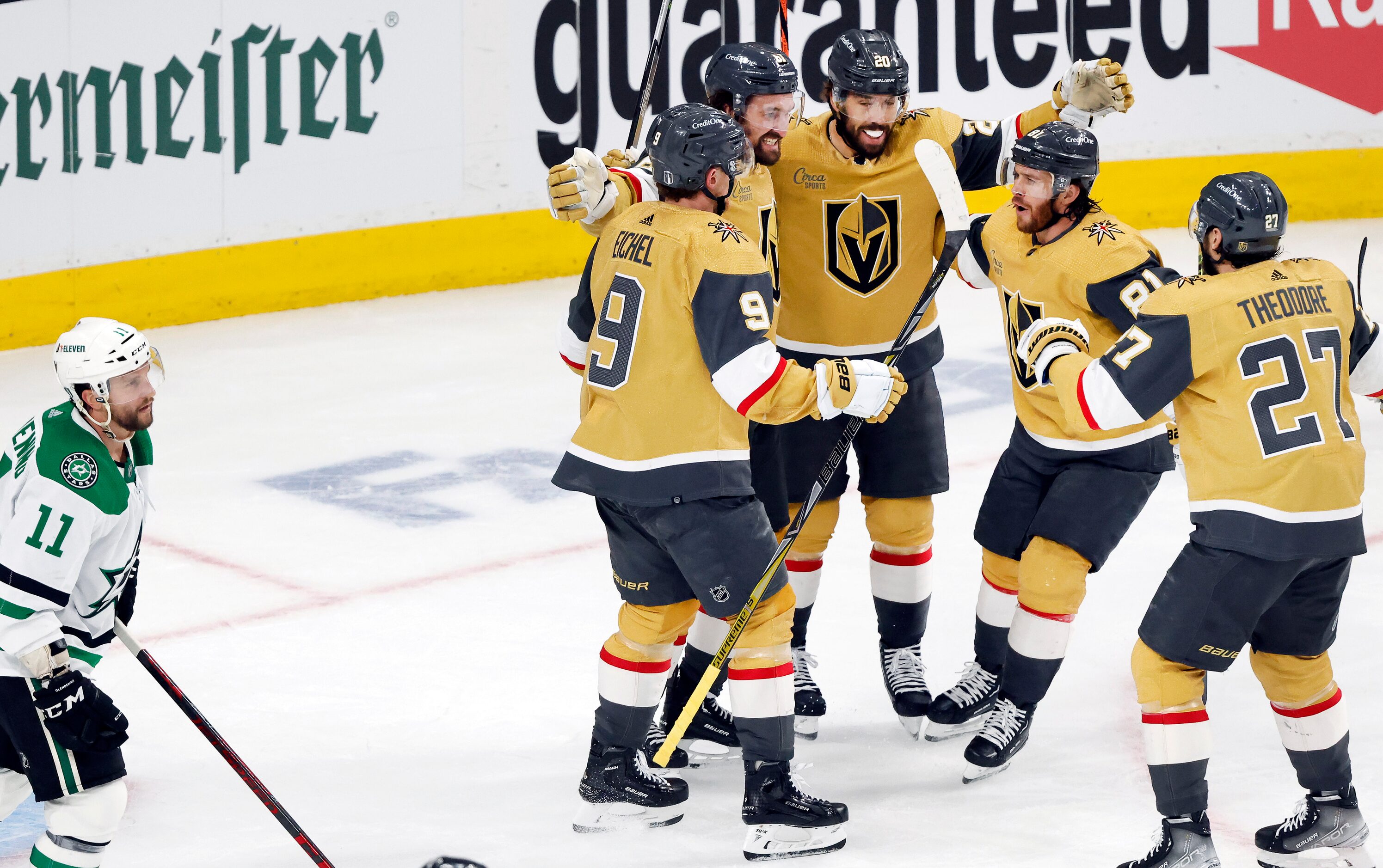 Teammates congratulate Vegas Golden Knights right wing Mark Stone (61) on his first period...