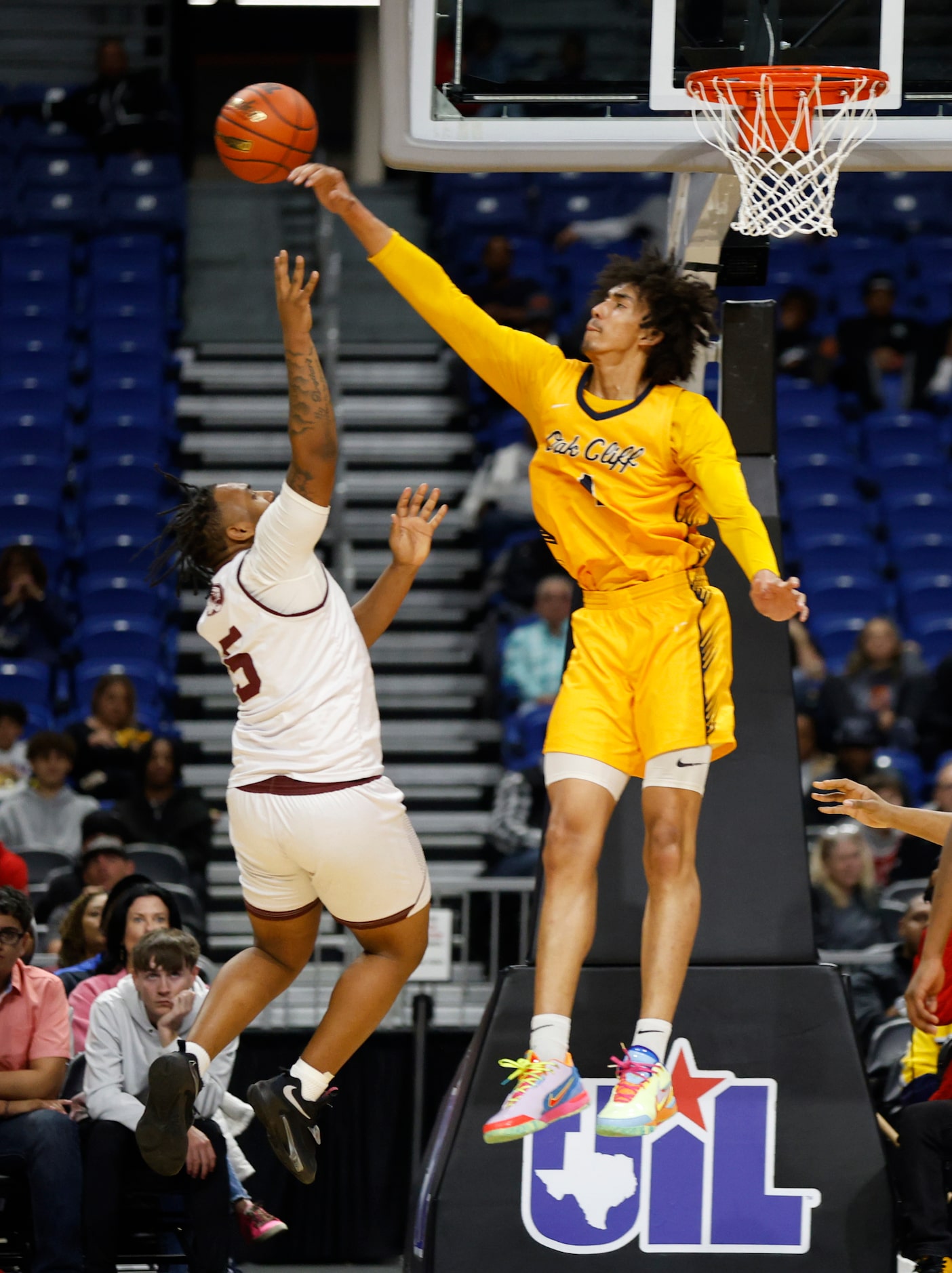 Oak Cliff Faith Family Academy Doryan Onwuchekwa (1) blocks the shot of Silsbee Tigers...