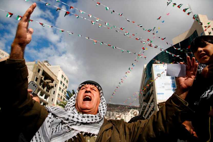Palestinian protesters took to the streets in the West Bank city of Nablus on Thursday to...