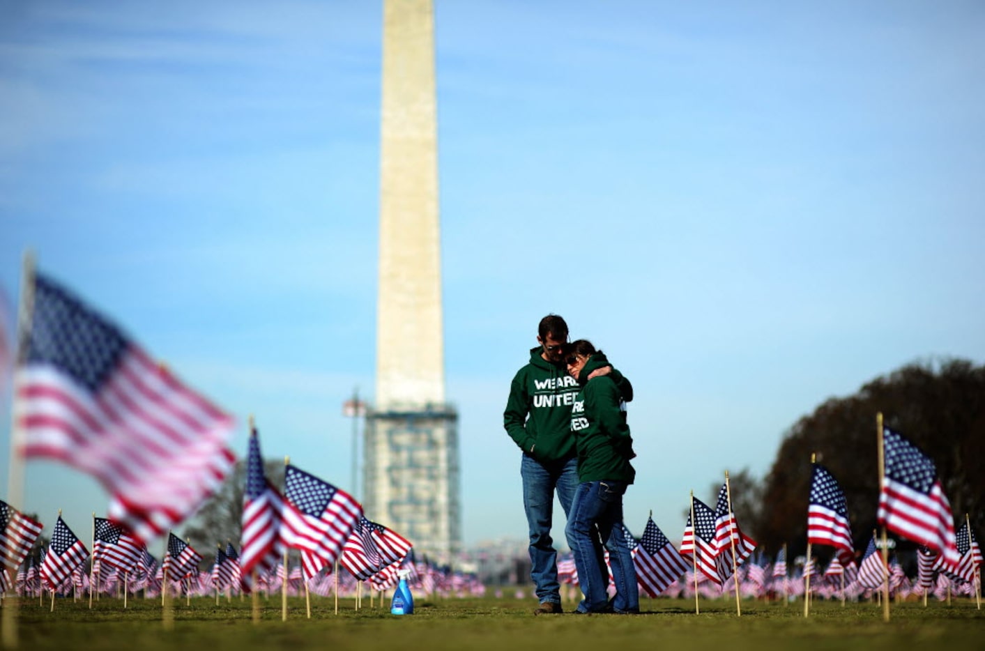 Iraq war veteran couple Colleen Ryan and Jeff Hensley of the US Navy comfort each other as...