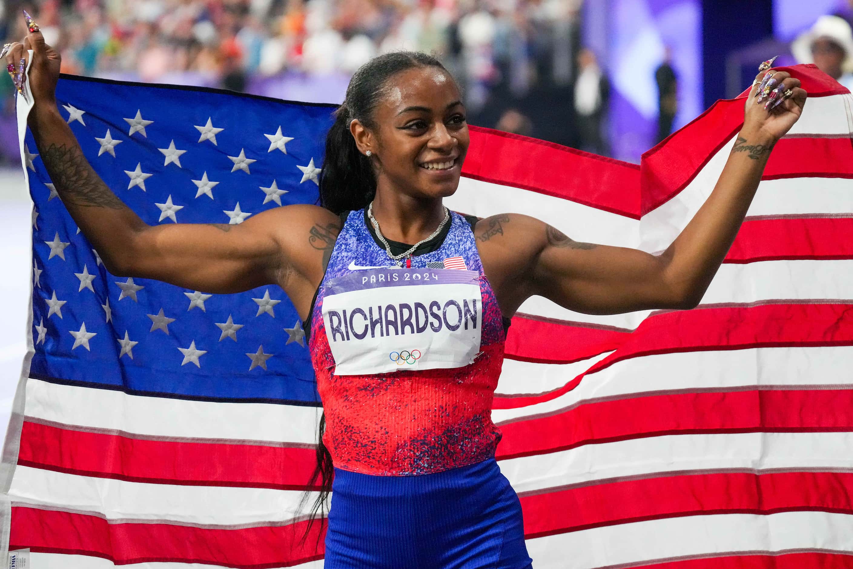 Sha'carri Richardson of the United States celebrates after a silver medal finish in the...