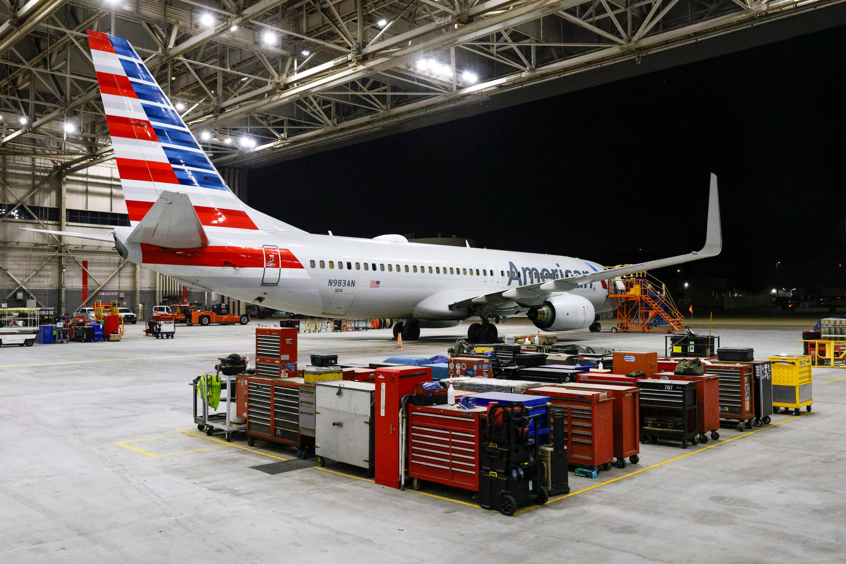 An American Airlines Boeing 737-823 sits inside a hangar at American’s maintenance facility...