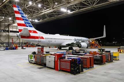 An American Airlines Boeing 737-823 sits inside a hangar at American’s maintenance facility...