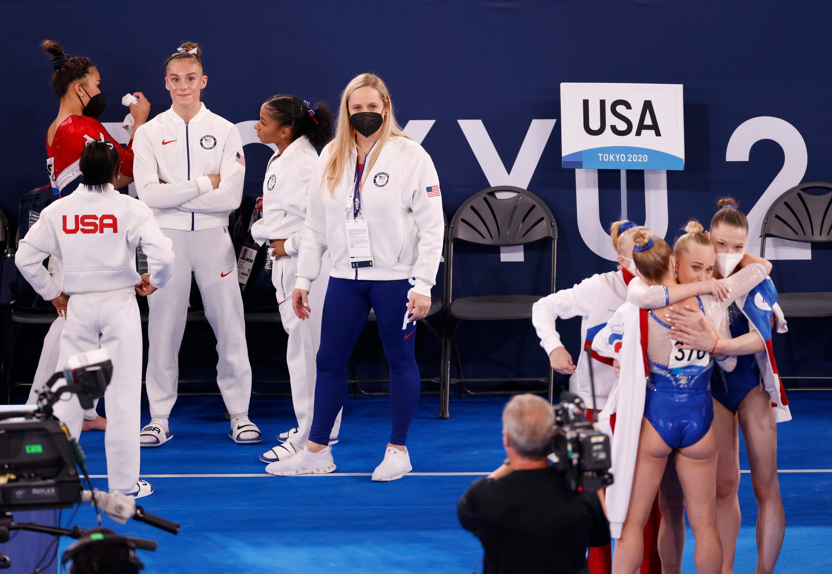 Team USA watches as ROC celebrates winning gold during the artistic gymnastics women’s team...