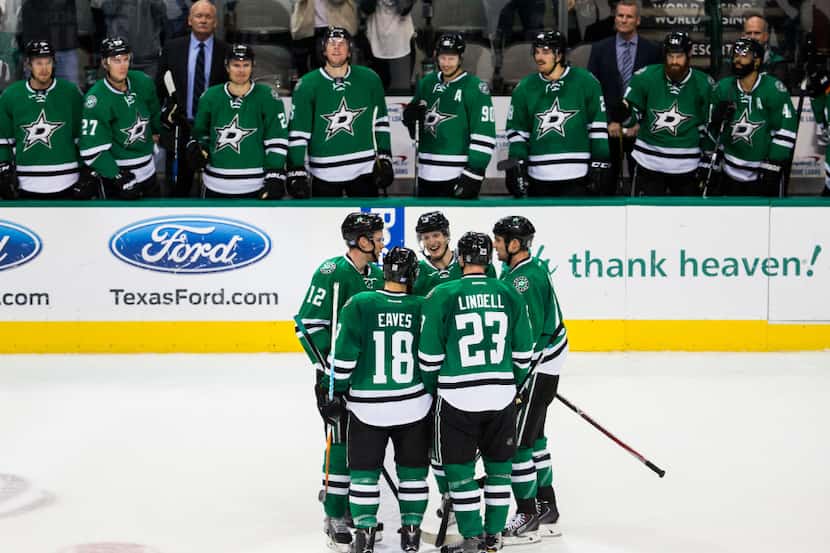The Dallas Stars celebrate a goal during the third period of their game against St. Louis...