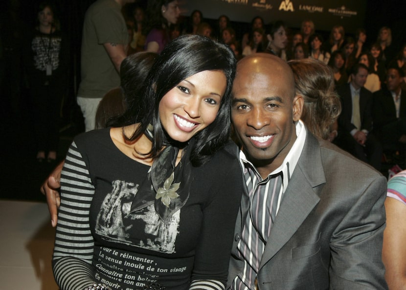 Pilar Sanders, left, and Deion Sanders attend the Intermix runway show at Fashion at the...