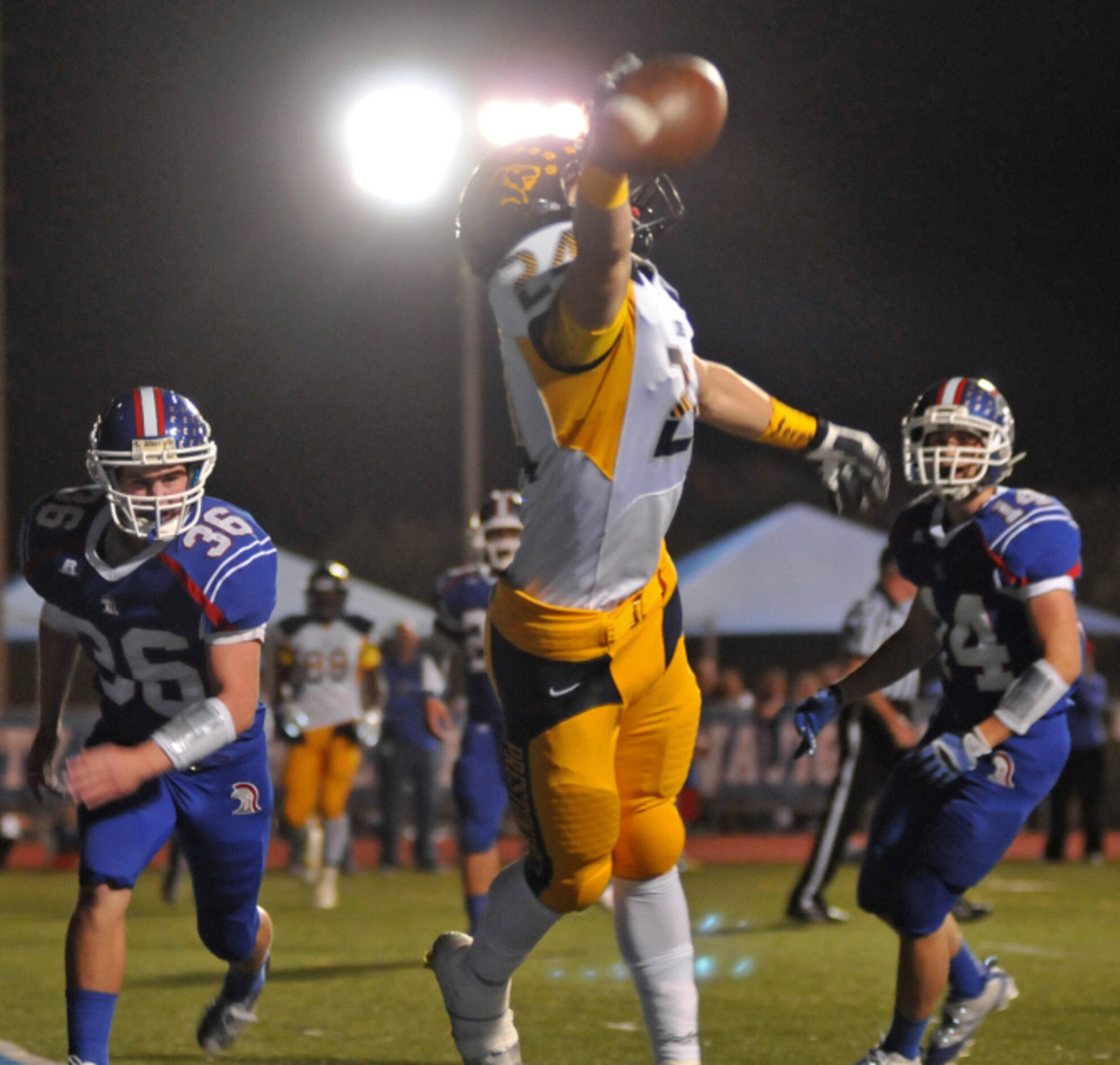 Prestonwood Christian Academy sophomore Raleigh Beougher (24) stretches for an overthrown...