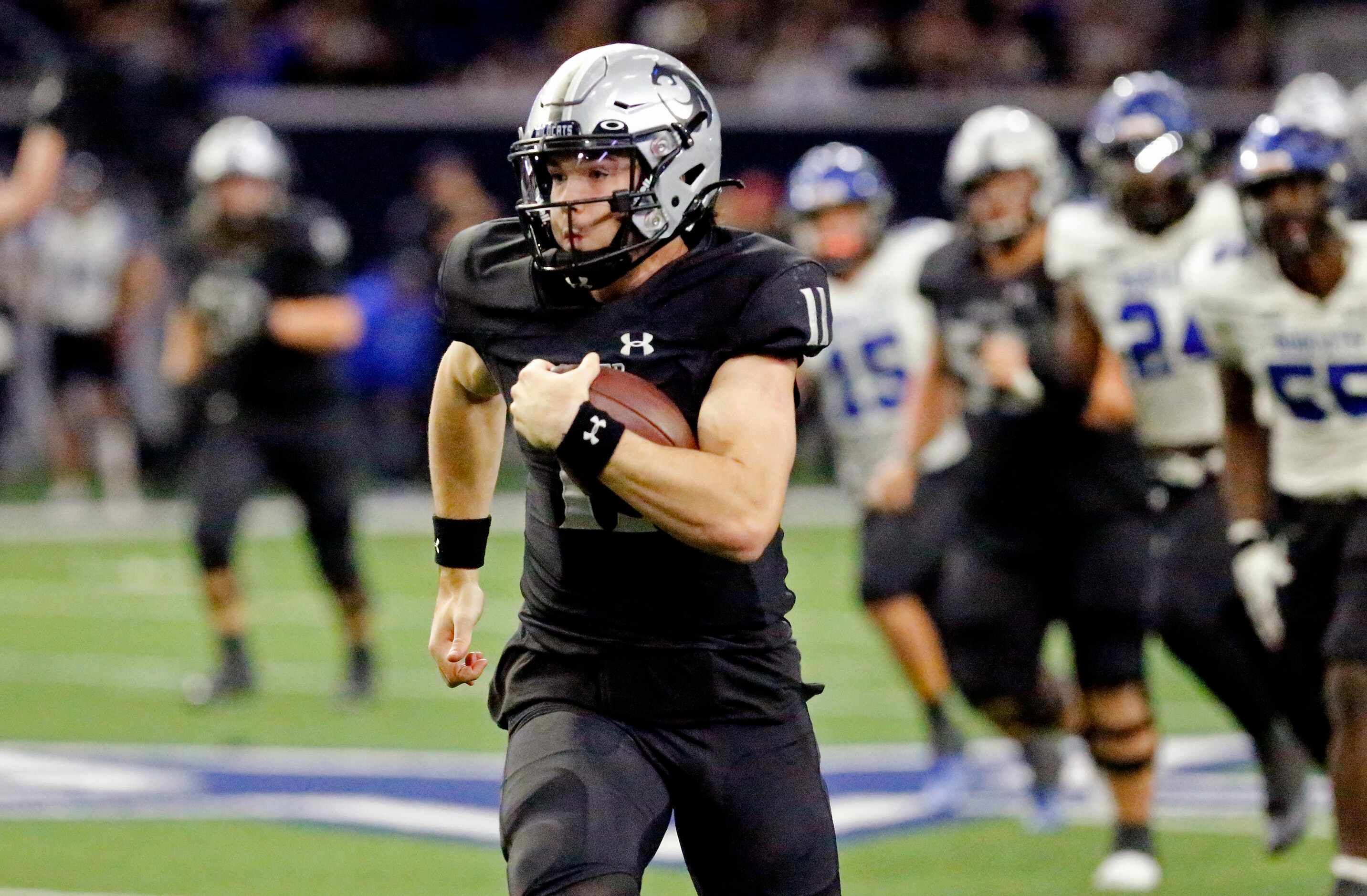 Guyer High School quarterback Jackson Arnold (11) set up the final touchdown of the game...