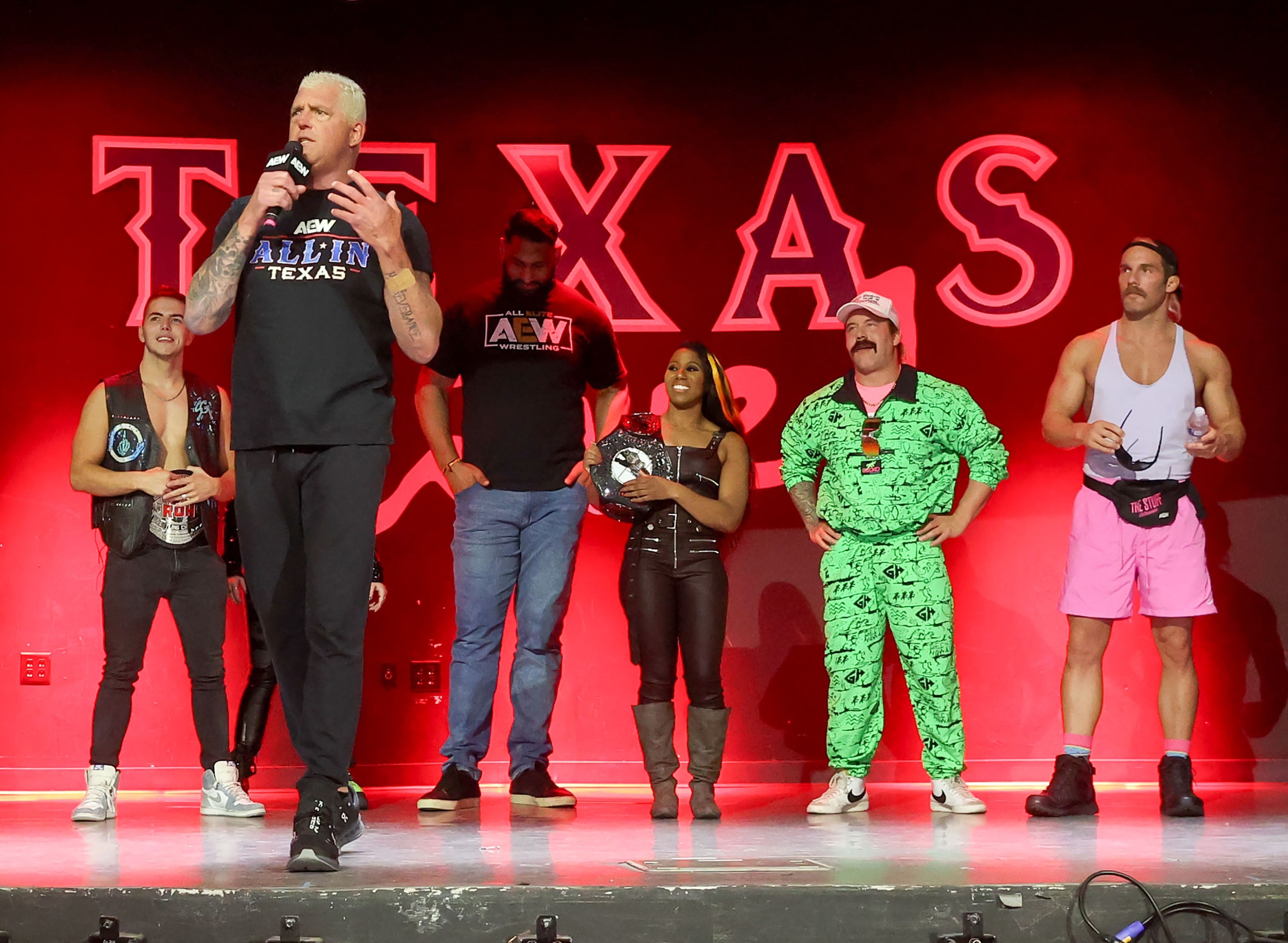 Dustin Rhodes talks with the crowd at the All Elite Wrestling kickoff party on Wednesday,...