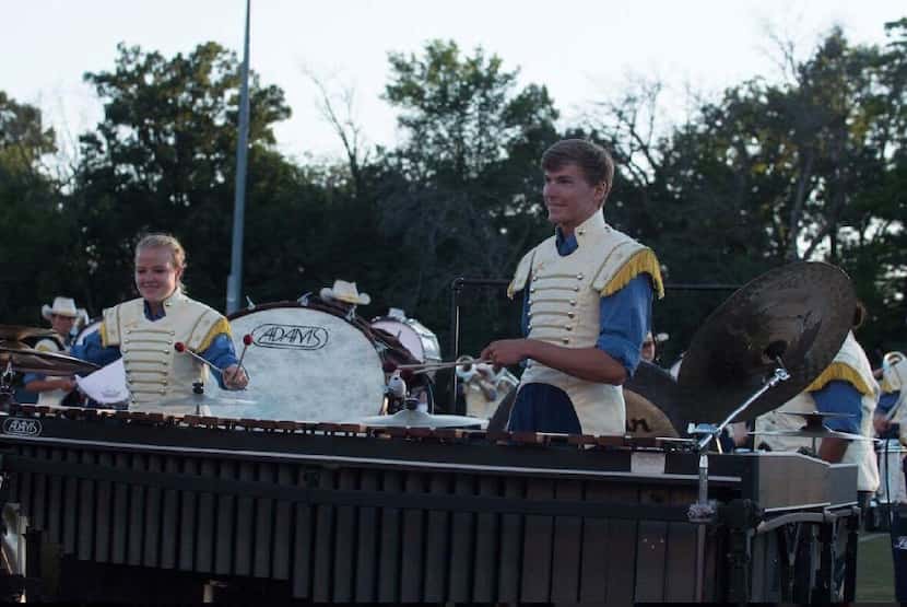 Jacob Hord (right) plays marimba during the Troopers DCI show.