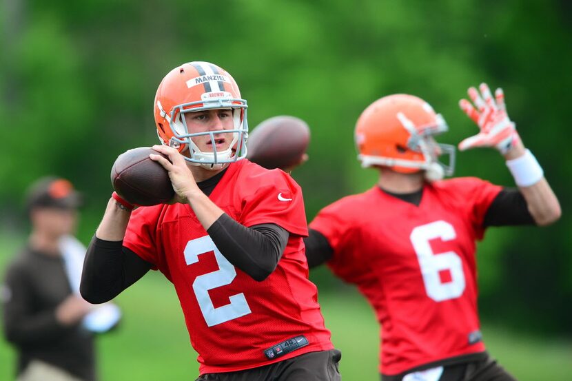 May 28, 2014; Berea, OH, USA; Cleveland Browns quarterback Johnny Manziel (2) and Brian...