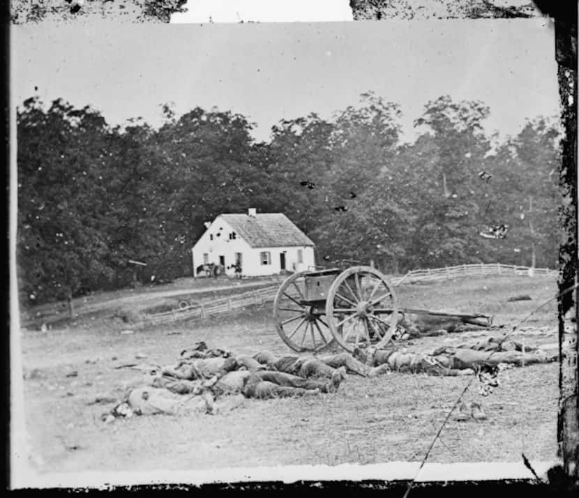 Confederate dead lie in front of the Dunker church on the Antietam battlefield in Antietam,...