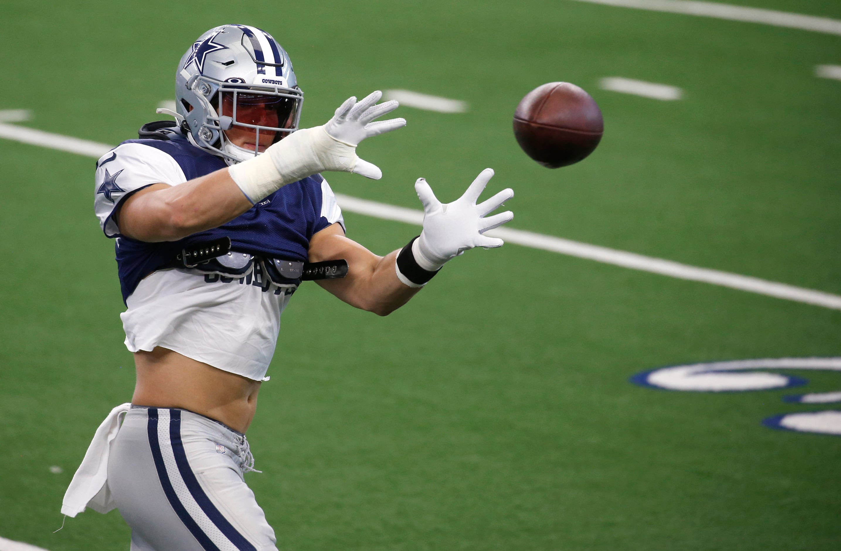 Dallas Cowboys players wear no names on uniforms during scrimmage