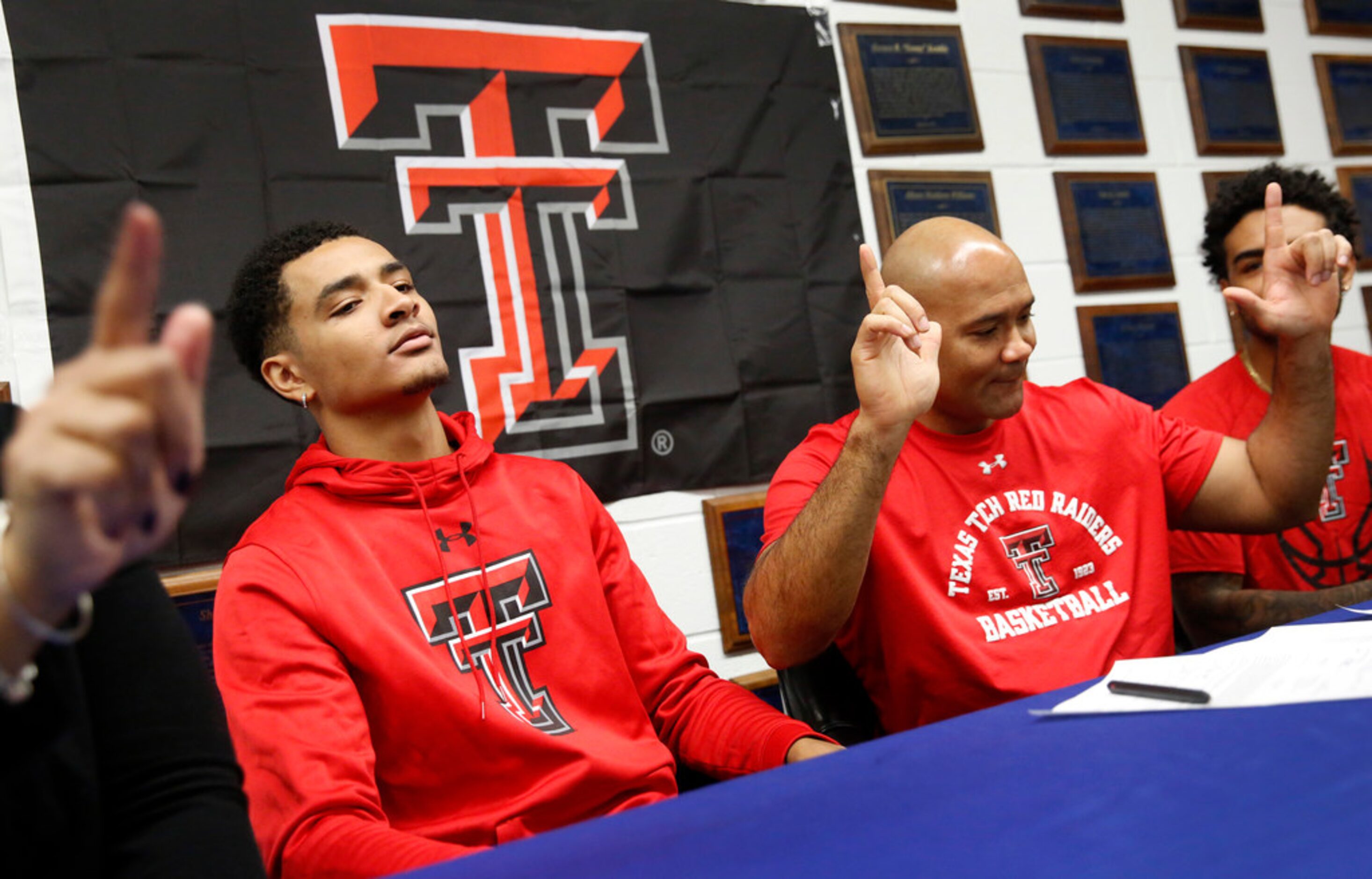 Alongside his parents, head coach David Peavy and Tamara Peavy (left, not pictured),...