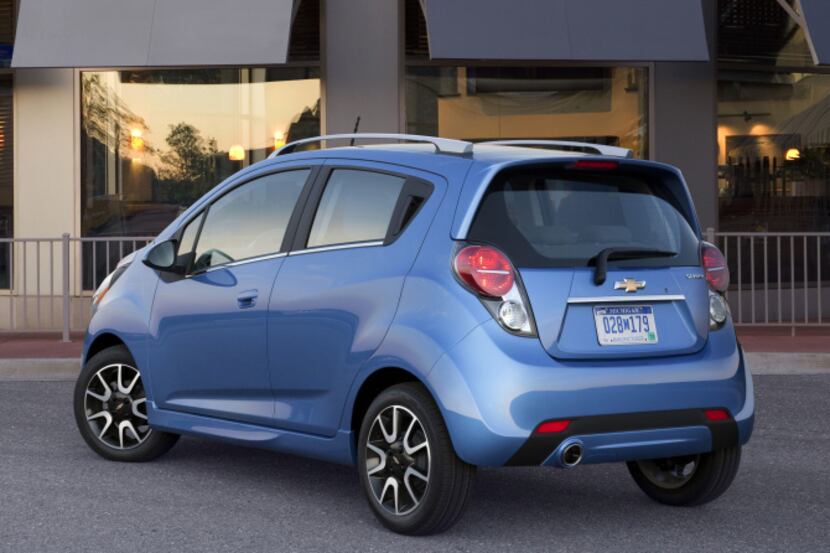 The 2013 Chevrolet Spark LS base model is priced at $12,995 and includes air conditioning...