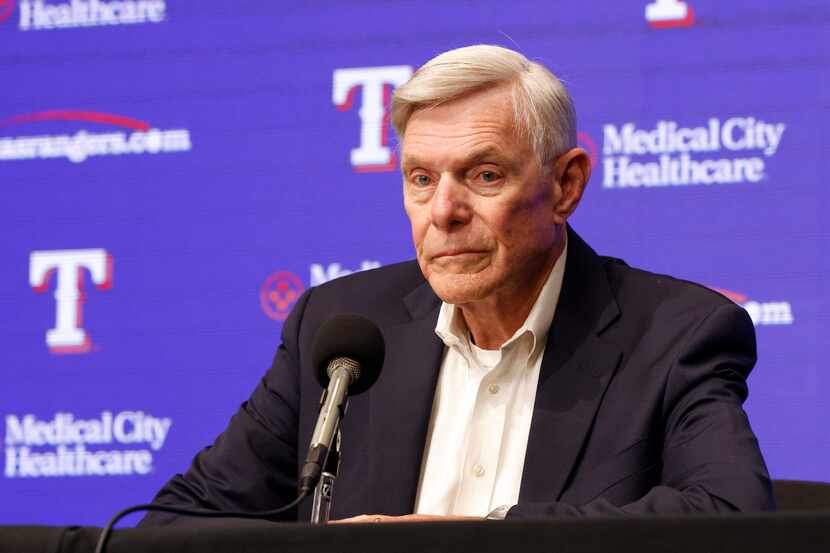 Texas Rangers owner Ray Davis listens to a question during a news conference after firing...