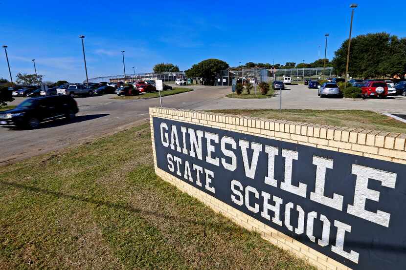 An SUV leaves the Gainesville State School in Gainesville, Texas, Friday, Oct. 28, 2016. 