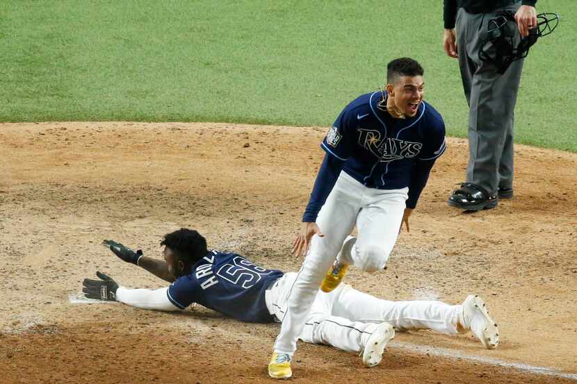 Tampa Bay Rays shortstop Willy Adames (1) celebrates after Tampa Bay Rays left fielder Randy...
