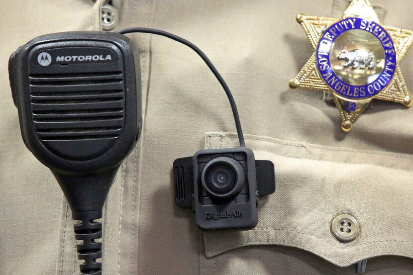 In this Sept. 22, 2014 file photo, a body camera is displayed at a news conference at the...