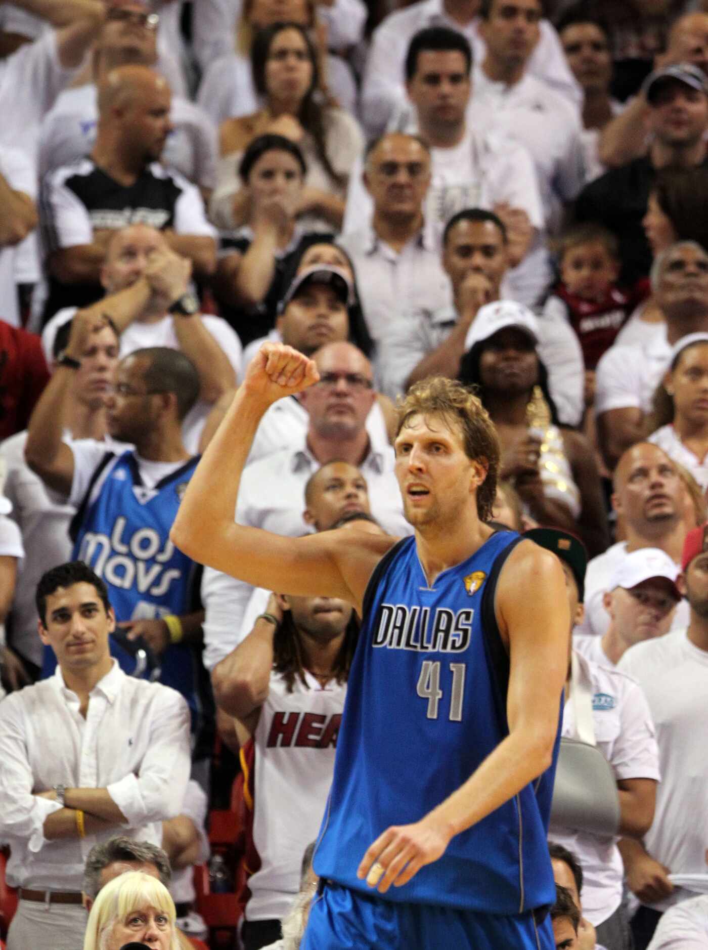 Dallas Mavericks power forward Dirk Nowitzki (41) rearts after making a basket in the fourth...