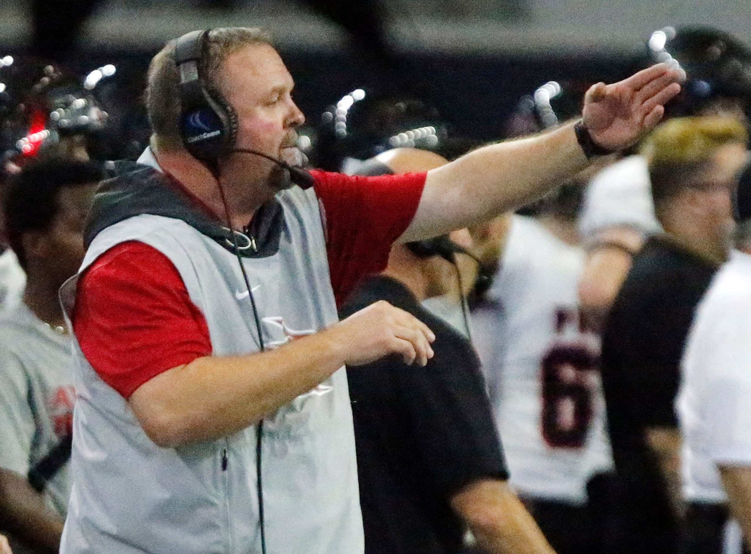 Colleyville Heritage head coach Joe Willis gives direction to his defense with 14 seconds...