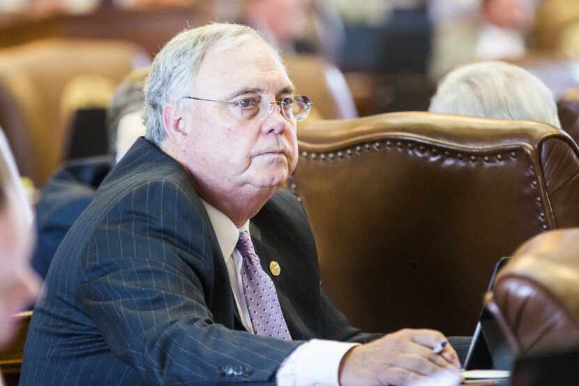 Rep. Drew Darby, R-San Angelo, votes on legislation from his desk during the final days of...