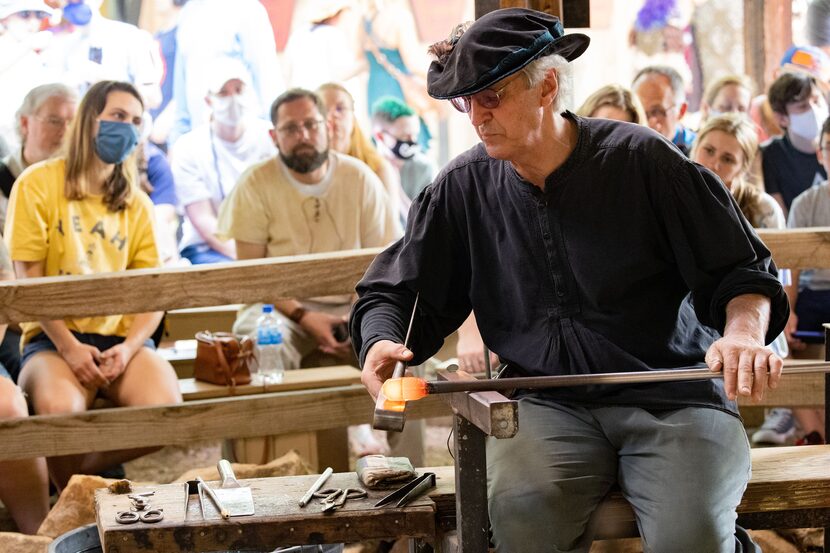 Peter Andres of Andres and Chapman demonstrates glassblowing, one of the crafts featured by...