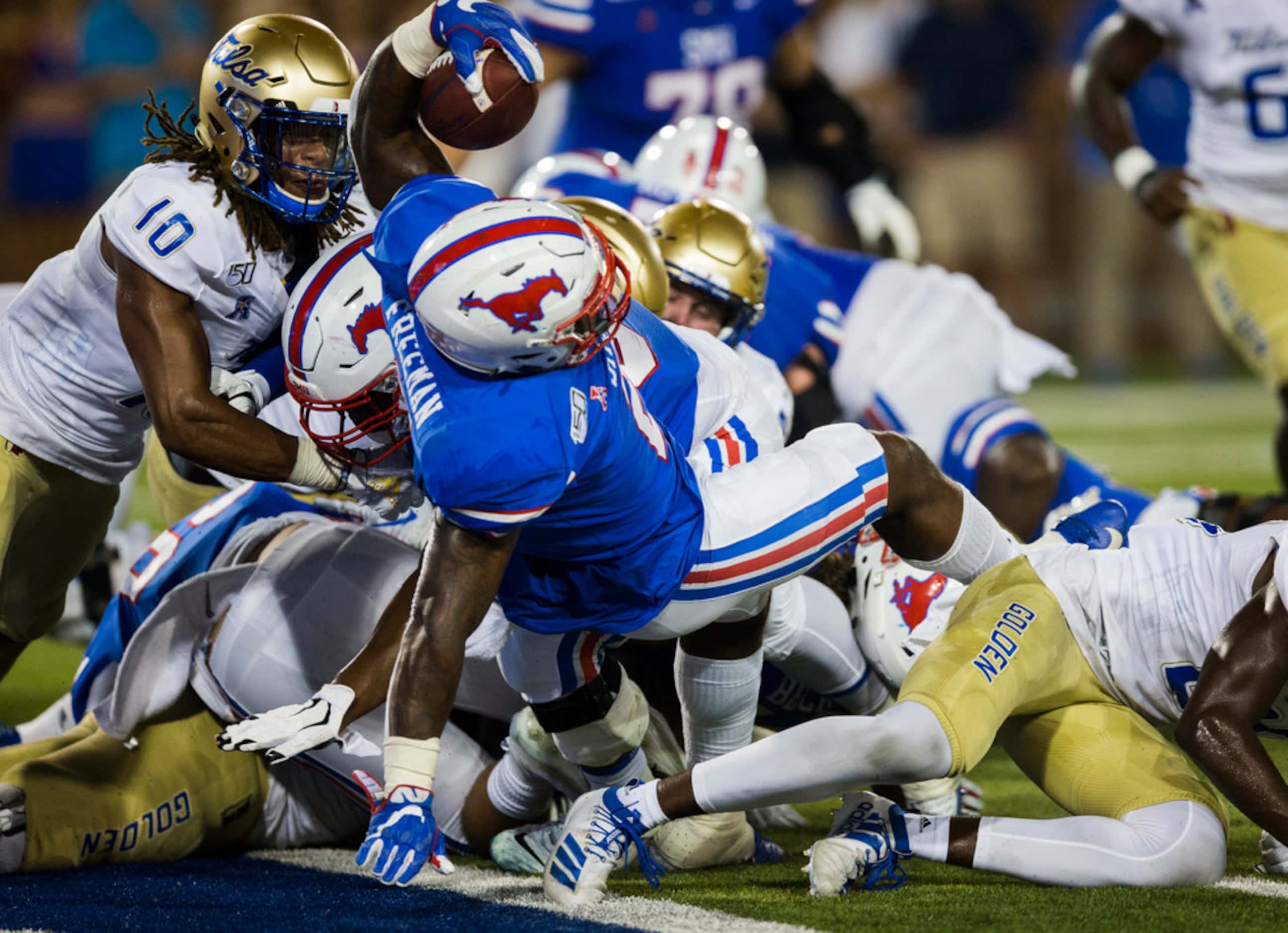 SMU Mustangs running back Ke'Mon Freeman (2) dives over the goal line for a touchdown during...
