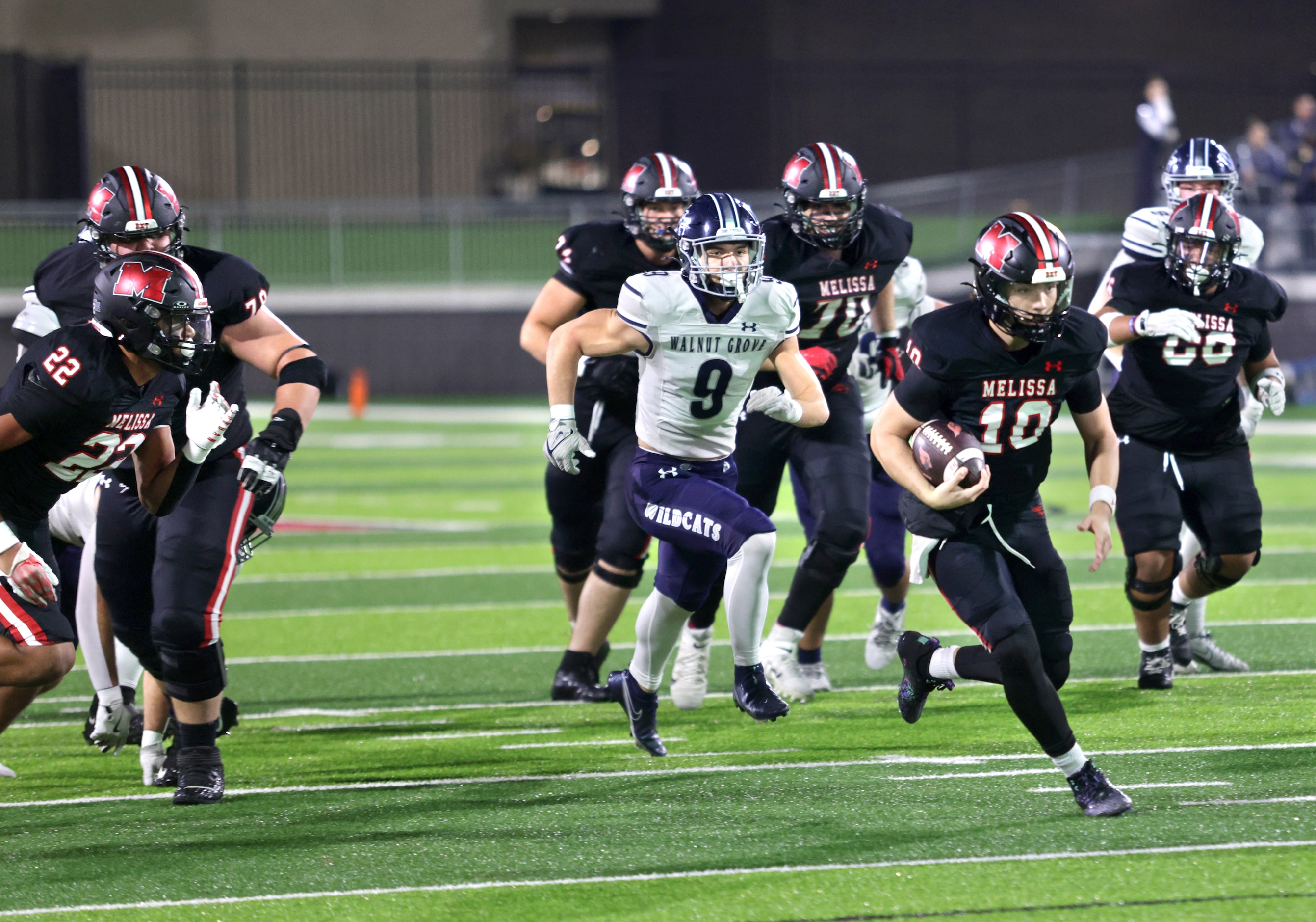 Melissa player #10 Noah Schuback runs the ball during the Prosper Walnut Grove High School...