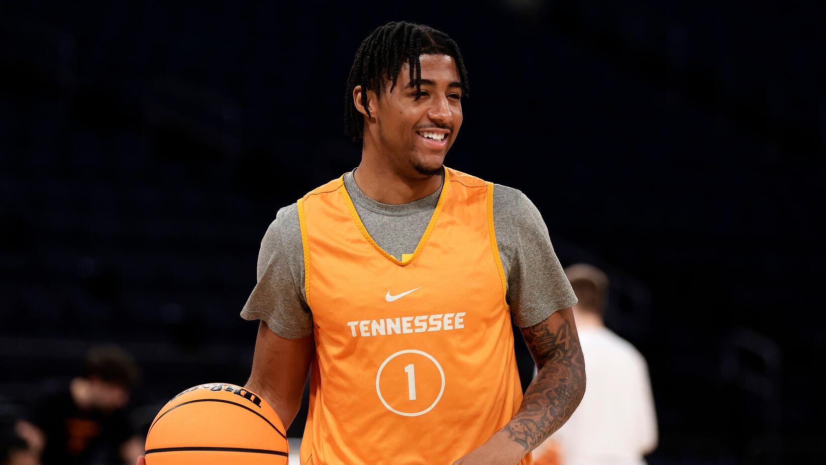 Tennessee guard B.J. Edwards laughs during practice before a Sweet 16 college basketball...
