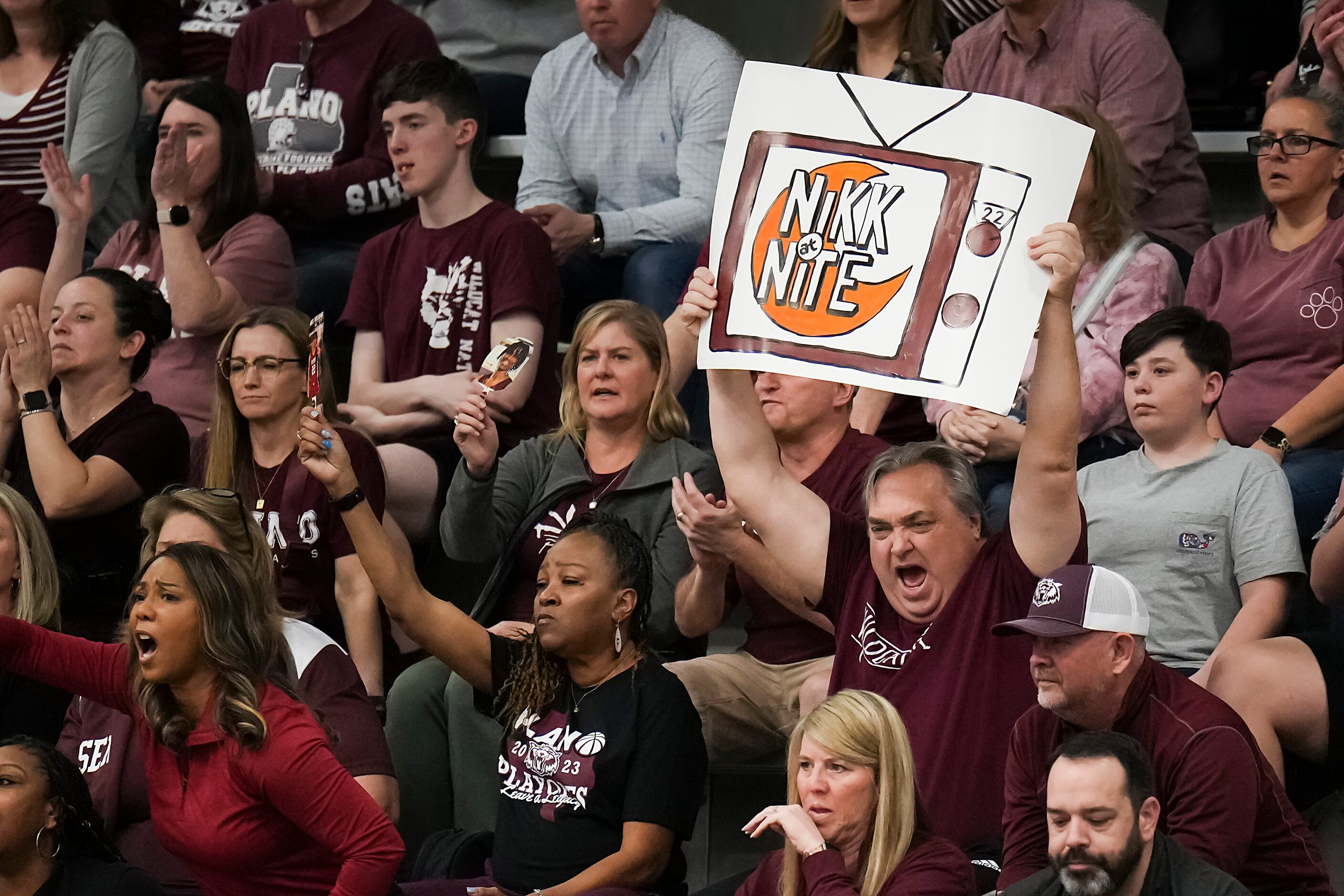 Plano fans cheer forward Nikk Williams during the first half of a boys Class 6A bi-district...