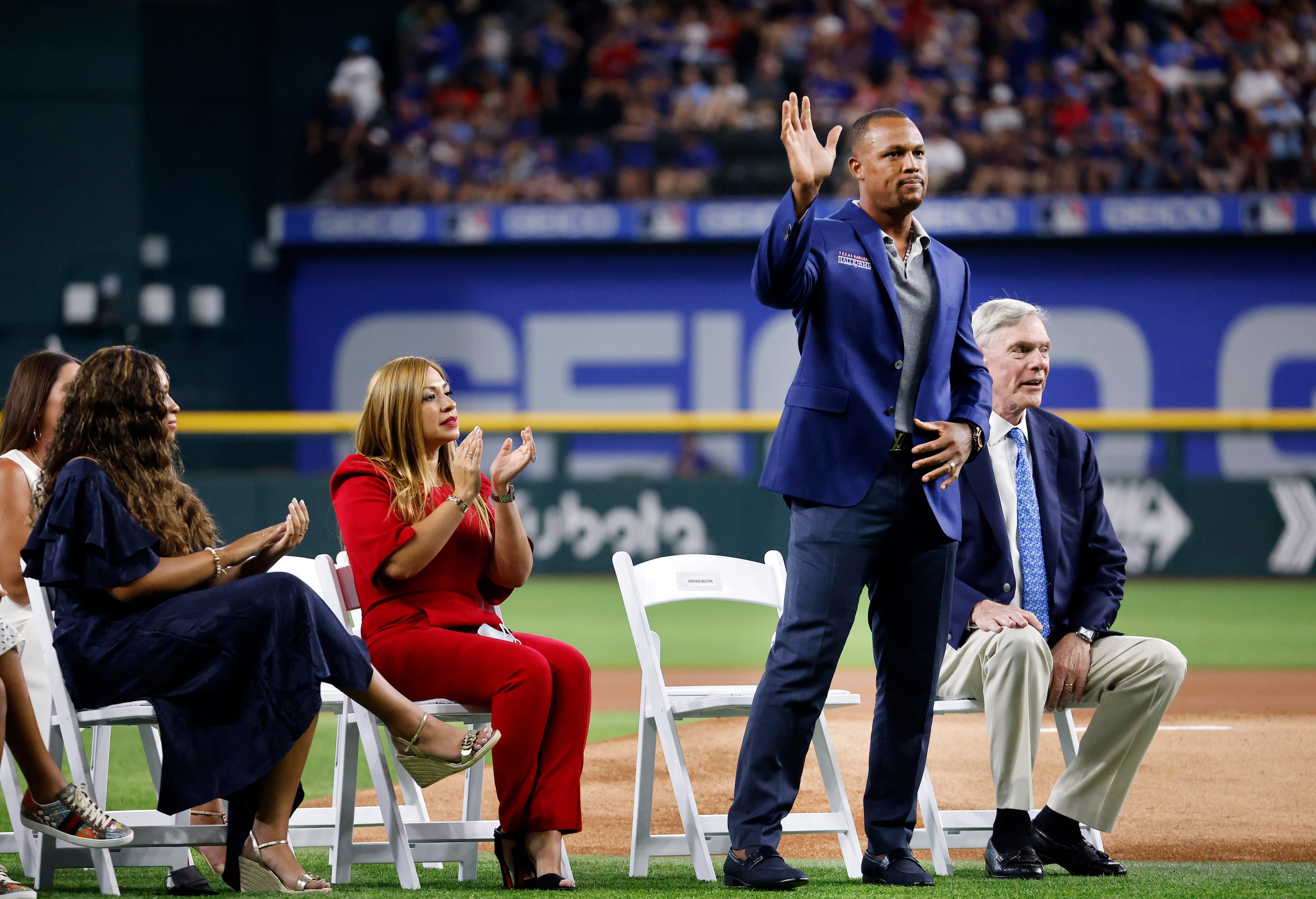 Former Texas Rangers third baseman Adrian Beltre (left) waves to fans after his Texas...