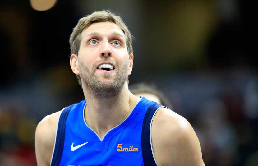 INDIANAPOLIS, IN - JANUARY 19:  Dirk Nowitzki #41 of the Dallas Mavericks watches the action...