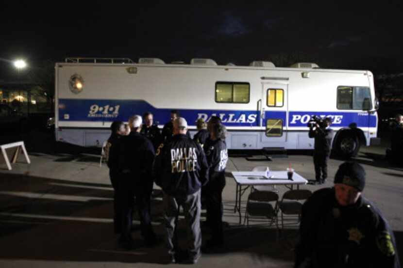 Dallas Police and Dallas County Sheriffs personel gather at the process center for The...
