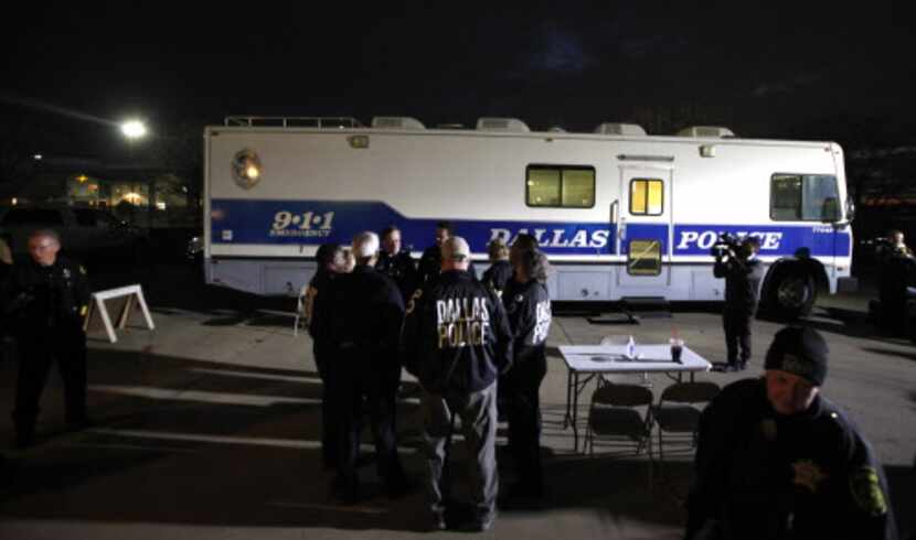 Dallas Police and Dallas County Sheriffs personel gather at the process center for The...