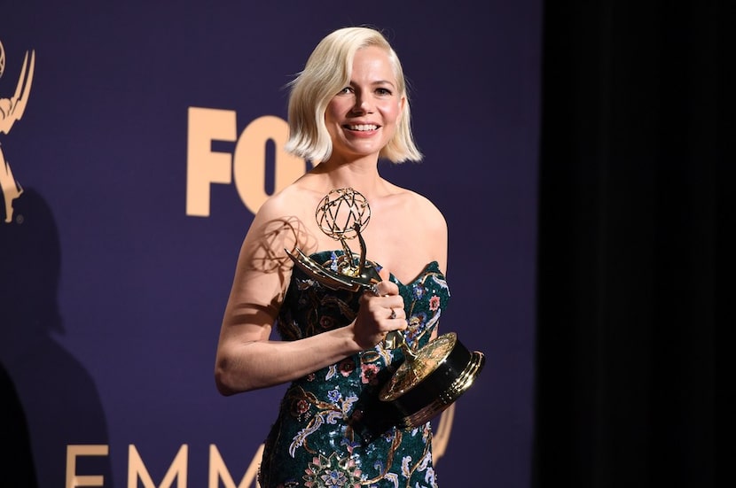 Actress Michelle Williams poses with the Emmy for Outstanding Lead Actress In A Limited...