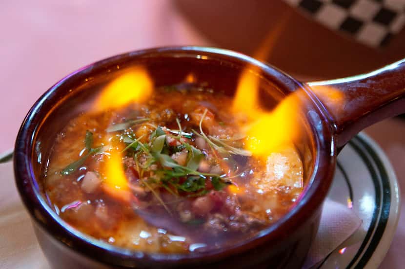 Queso flameado is one of the retro classics at Las Palmas, a new Tex-Mex restaurant that...