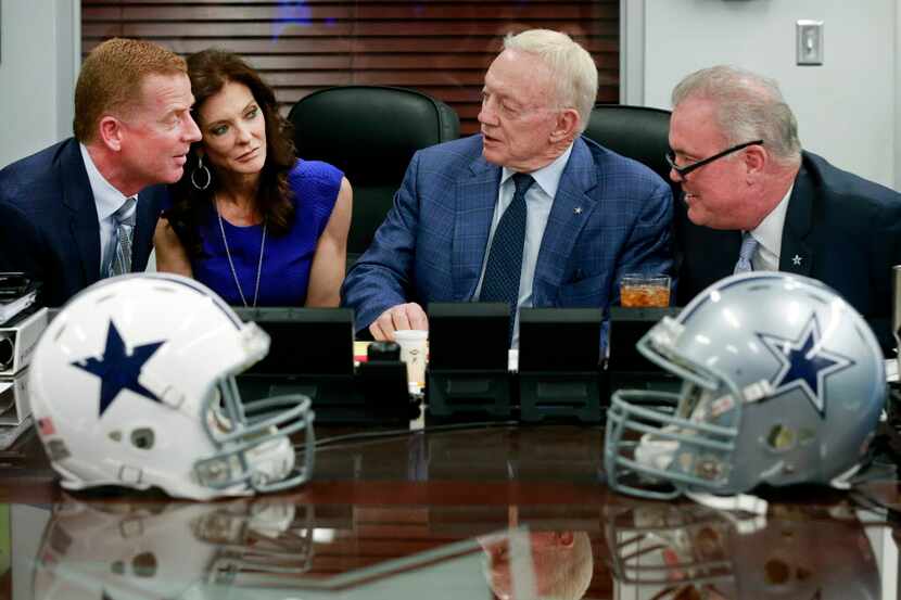 (from left) Dallas Cowboys head coach Jason Garrett, Executive Vice President and Chief...