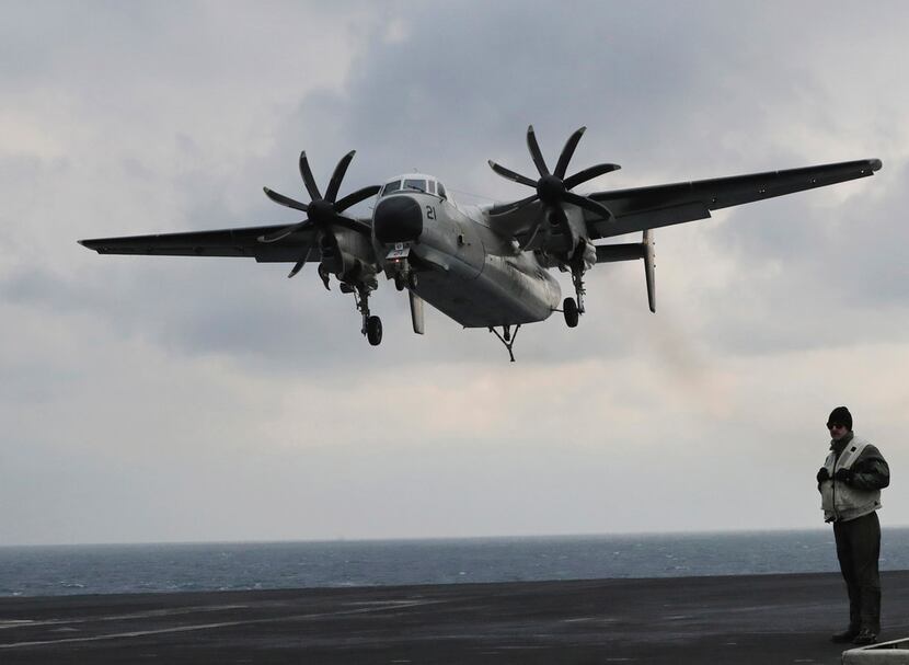 This U.S. Navy C-2 Greyhound, shown here in March 2017 in waters east of the Korean...