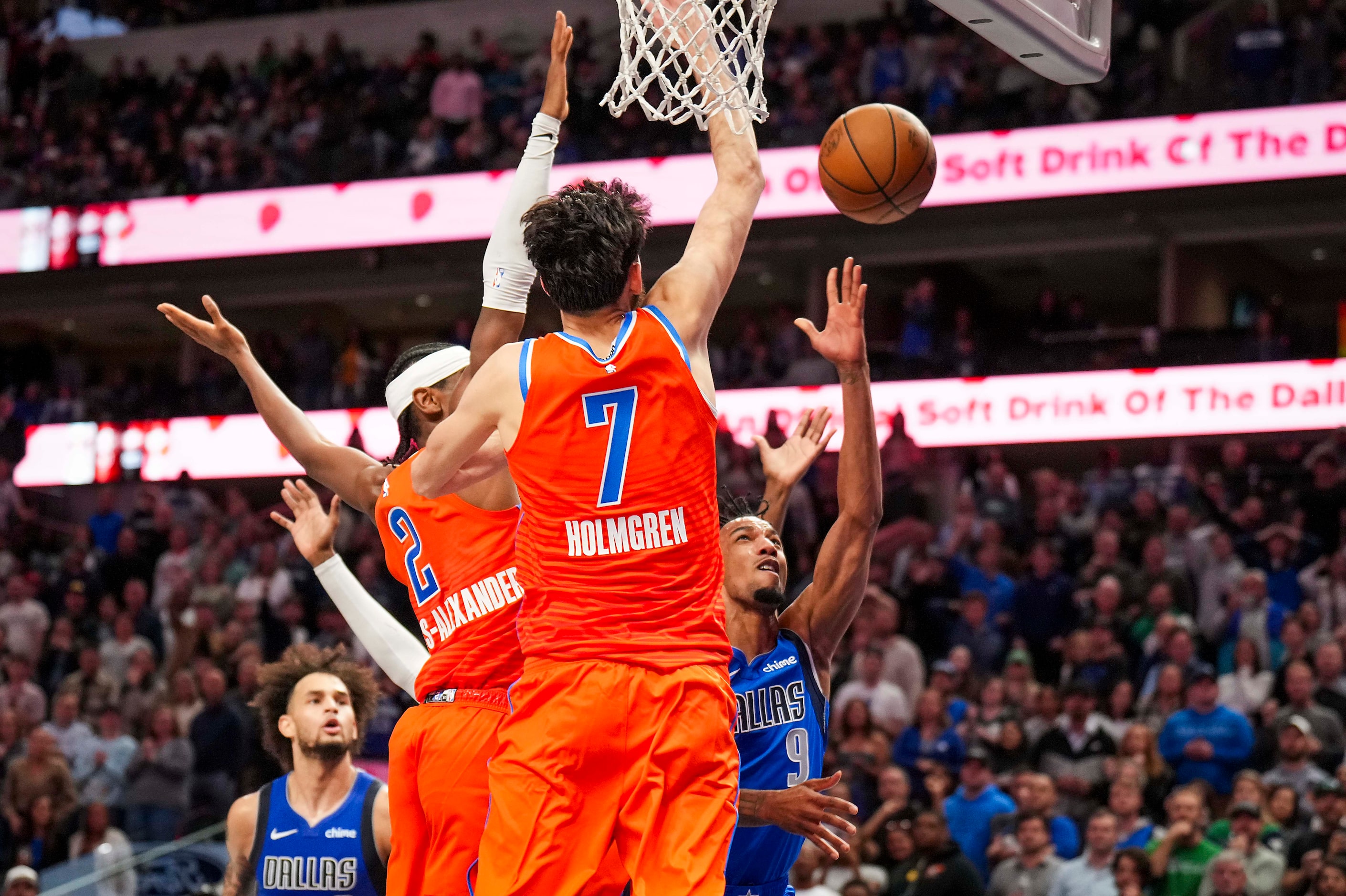 Dallas Mavericks guard A.J. Lawson (9) drives to the basket against Oklahoma City Thunder...