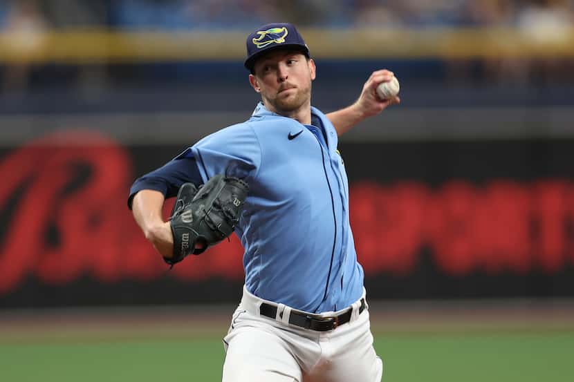 Tampa Bay Rays starting pitcher Jeffrey Springs delivers a pitch in the first inning of a...