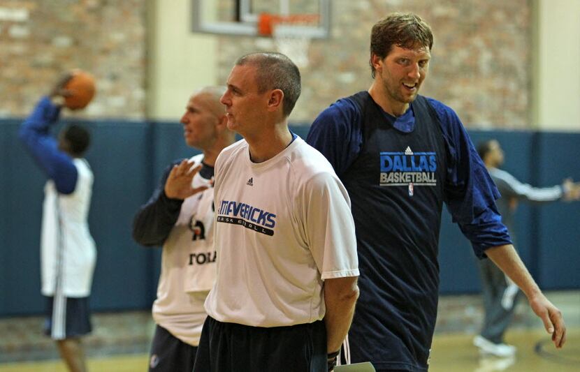 Dallas' Jason Kidd, head coach Rick Carlisle and Dirk Nowitzki are pictured during the first...