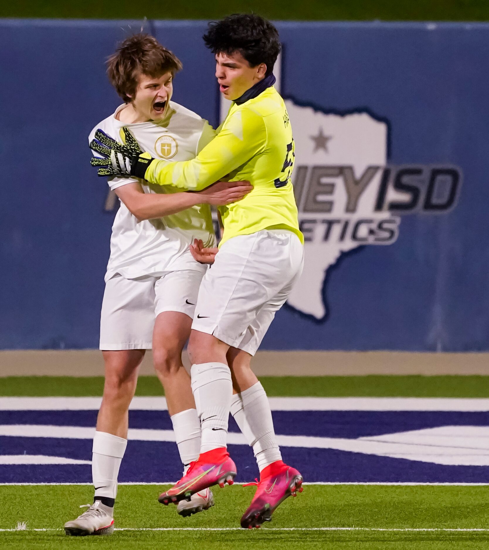 Jesuit midfielder Sullivan Scott celebrates with goalkeeper Cole Hines after Scott’s goal in...