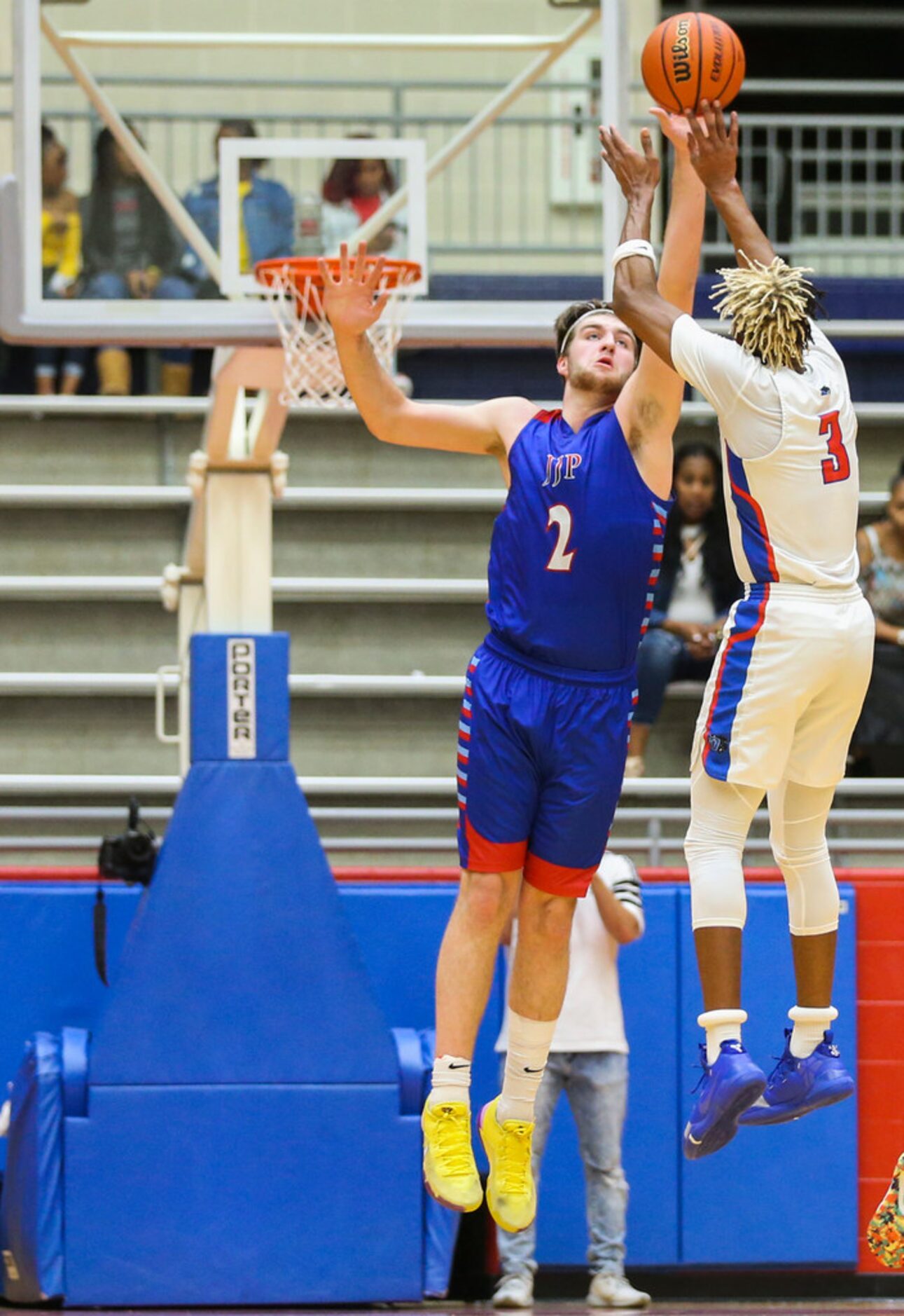 Duncanville guard Jahmius Ramsey (3) shoots over J. J. Pearce forward Drew Timme (2) during...