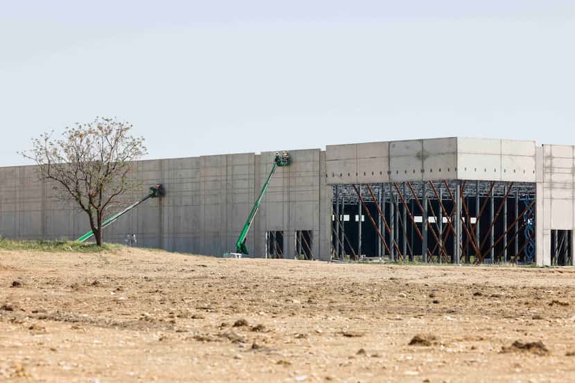 The volume of industrial construction is shrinking. This photo shows a building underway at...