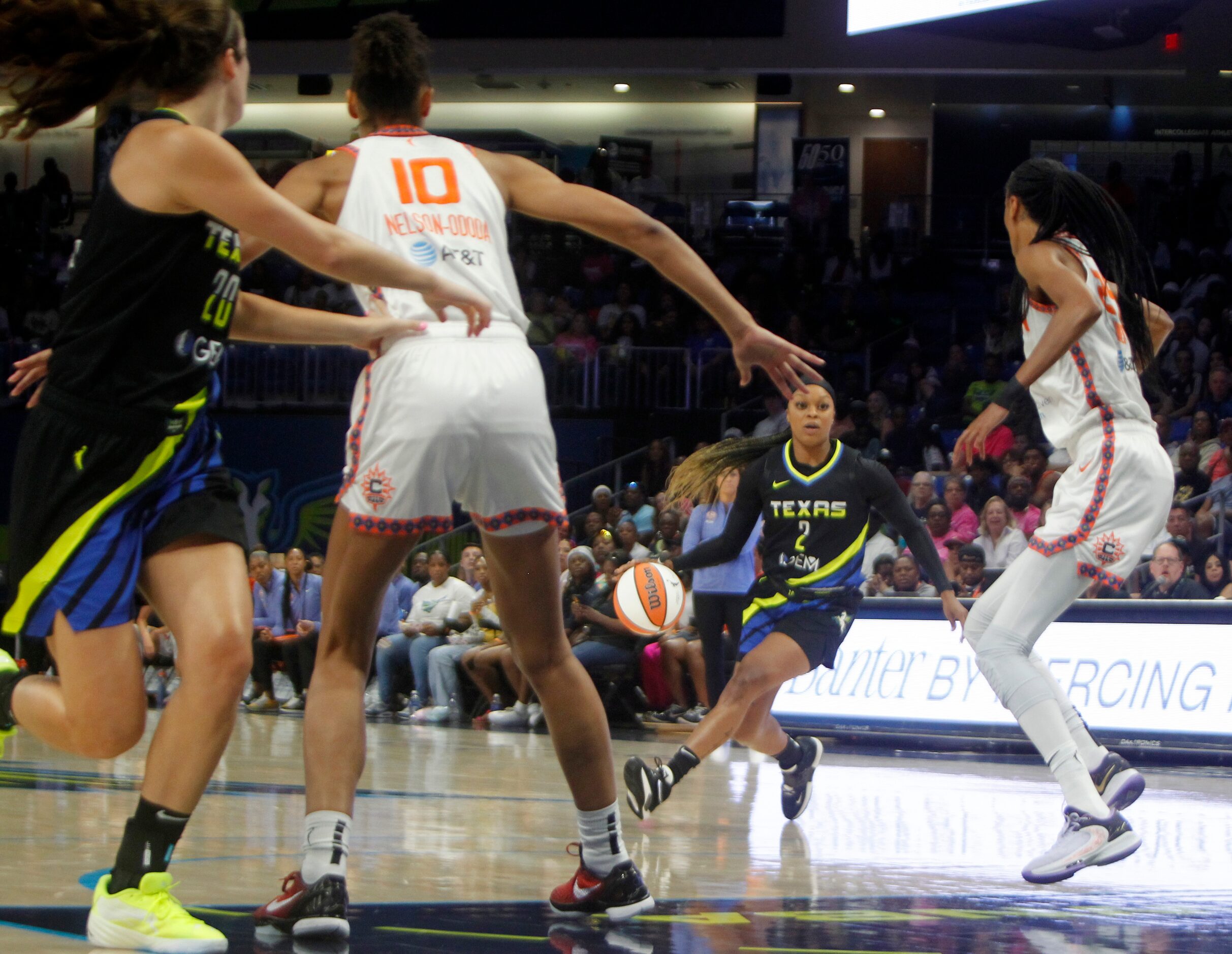 Dallas Wings guard Odyssey Sims (2) looks for a driving lane during first half action...