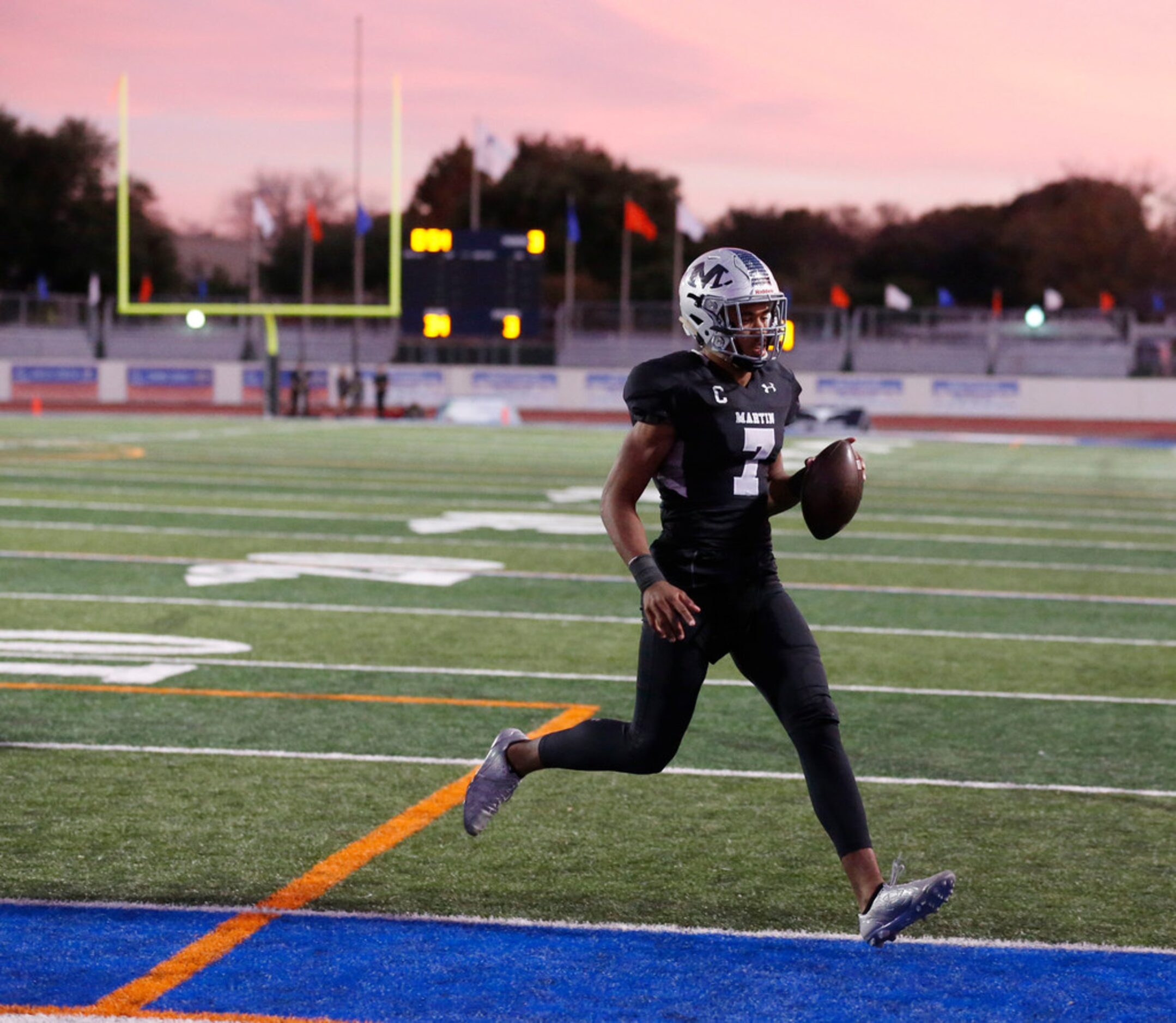 Arlington Martin player Brayden Willis (7) scores a touchdown against Odessa Permian during...