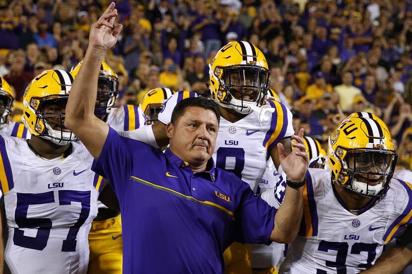 BATON ROUGE, LA - OCTOBER 22: Head coach Ed Orgeron of the LSU Tigers leads his team on the...